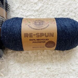 Lion Brand Re-Spun 100% Recycled Polyester Yarn. Deep Denim. Approx. 1974 Yards